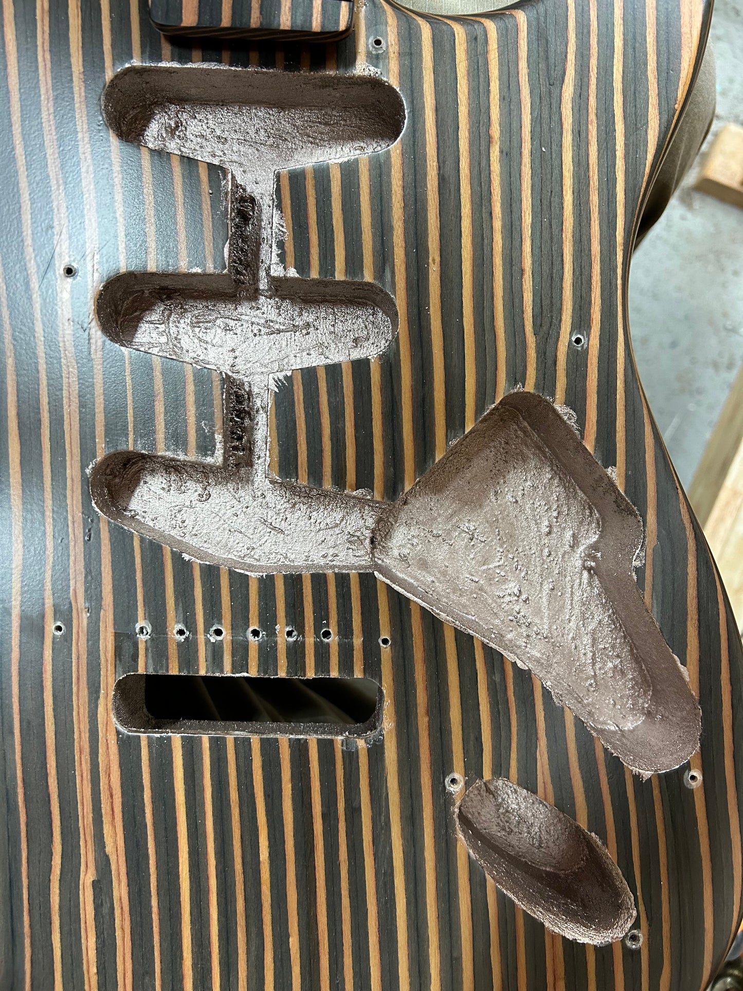Double-cut all Zebrawood guitar