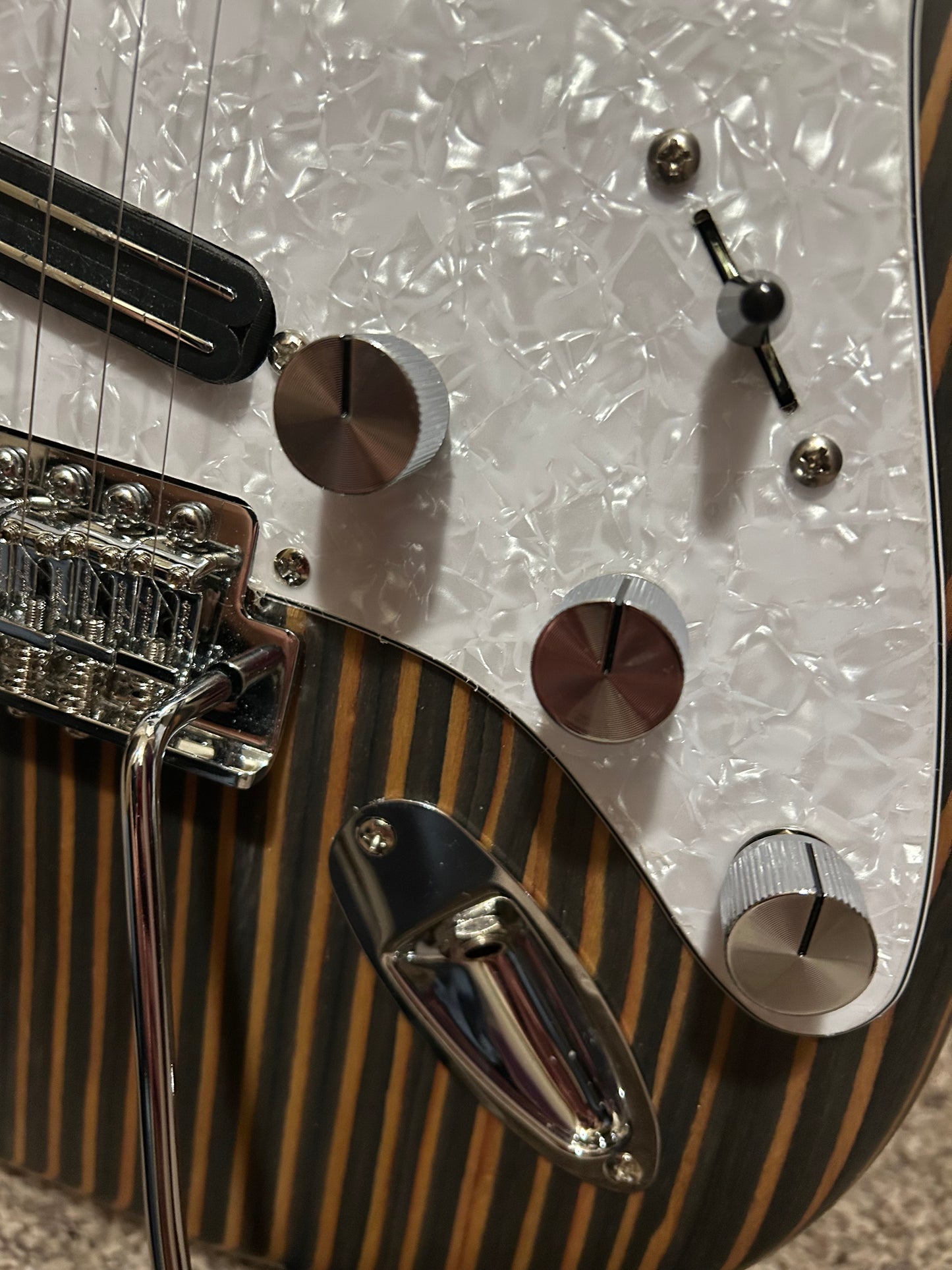 Double-cut all Zebrawood guitar