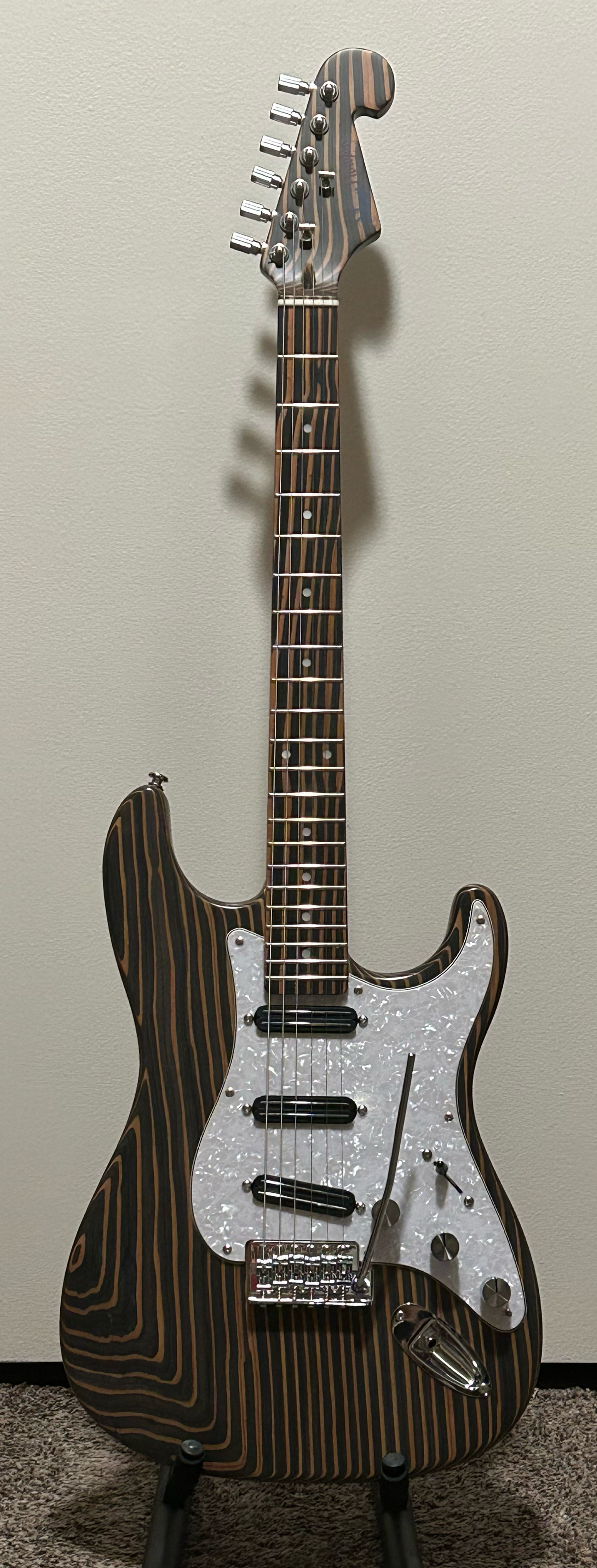 Double-cut all Zebrawood guitar